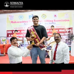 Powerlifter Darwin Horta is awarded the "Strongman" title after winning gold at the Maharashtra State Bench Press Championship.