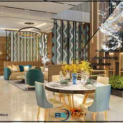 This design for an open-plan living area features a stylish partition to create a visual separation from the dining space. The round dining table and elegant chairs complement the modern aesthetic of the room.