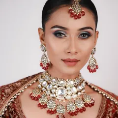 Master the flawless finish of airbrush makeup. This bridal look features a perfectly blended base and striking smokey eyes, a key technique covered in our advanced makeup modules.