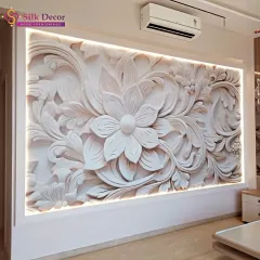 A wider view of the same 3D floral installation, showcasing how it transforms an entire wall into a focal point. The integrated lighting enhances the carved details, creating a warm and inviting ambiance.
