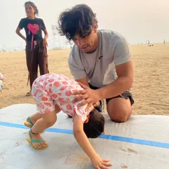 Here is one of our expert coaches providing gentle, one-on-one guidance during a bear crawl exercise. This hands-on support helps children master new movements, build core strength, and feel secure.