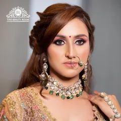 This shot highlights the flawless blending of the eyeshadow and the perfectly sculpted cheekbones. This level of detail is what makes a look truly stand out.