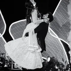 In the heart of the Sangeet, a moment of pure, weightless joy. I believe the best dance floor photos are unscripted, capturing the raw energy and connection between a couple.