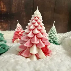 A beautiful red and white ombre Christmas tree candle. I make these in all colors to match any holiday theme.