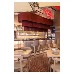 The 'Sushi Express' neon sign clearly defines the sushi bar area, using lighting as a functional and thematic tool. This is paired with a dramatic, tiered tassel chandelier to make the bar a distinct destination within the restaurant.