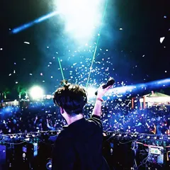 A moment of connection with the crowd under the stage lights and confetti. We don't just play music; we create a shared experience with every person in the audience.