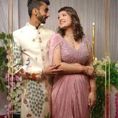 One of our favorite unique pieces on a happy client. The artistic peacock and deer motifs on this sherwani make it a memorable choice for a special day.