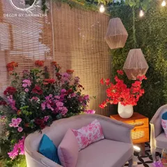 A closer look at the intimate lounge seating. The combination of rustic bamboo, soft lighting, and plush furniture created a warm and inviting atmosphere for the home wedding.