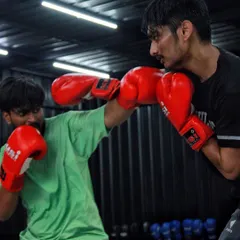 An intense exchange between two fighters. The raw emotion and focus here is what our community is all about.