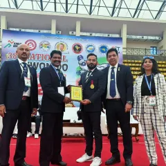 My commitment to Taekwondo has been recognized by the Taekwon-do Association of India. Here I am receiving the "Outstanding Instructor" award for my contributions to developing the sport.