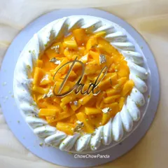 A special mango cake I made for Father's Day, topped with a "Dad" plaque.