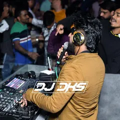 A great DJ does more than just play music. I get on the microphone to interact with the crowd, host segments, and build excitement, ensuring the energy never drops. This is me engaging with the audience during a high-energy set.