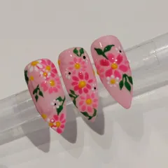 Delicate floral nail art is always in demand. I'll show you my technique for painting detailed petals and leaves, using different brush types to create beautiful, layered flower designs like this one.