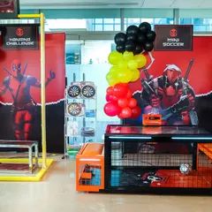 Action-packed game zone. A Deadpool-themed party isn't complete without challenges like mini soccer and a hanging challenge, ensuring guests are entertained for hours.