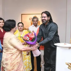 Welcoming esteemed guests with flowers at the inauguration of my exhibition. The support from the art community and patrons is what makes these shows possible and successful.