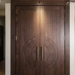 For a grand entrance, I designed this solid double door with a classic carved pattern. The rich American walnut and detailed craftsmanship give it a timeless, stately presence that speaks of pure luxury.