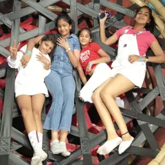 Taking a break at the top! Our netted climbing structures offer a fun challenge and a cool place to hang out with friends before deciding which activity to tackle next.