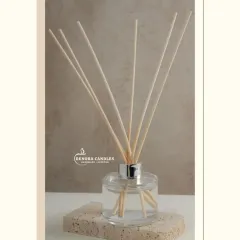 For a clean and minimalist look, I offer this diffuser with a polished silver cap and natural reeds. It is pictured here on a travertine block to show how well it fits with natural decor elements.