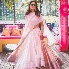 For daytime functions or summer weddings, I can stitch lighter lehengas like this beautiful pink one. The focus here is on elegant fabric and a comfortable, flowing silhouette.