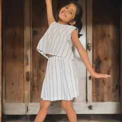 A simple, chic look for your little mover. This striped set features a crop top and a matching skort, which gives her the look of a skirt with the freedom of shorts. It's perfect for dancing, playing, and just being a kid.
