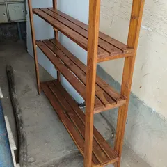 Here is the teak wood frame after we salvaged it from the old sofa. With a bit of cleaning and polishing, it was ready to be transformed into a sturdy, custom plant stand.