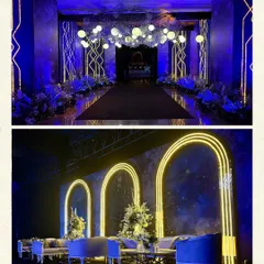 An electrifying entrance for a galaxy-themed Sangeet. We used deep blue lighting, neon arches, and a custom ceiling installation to create a futuristic and dramatic welcome for guests.