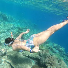 Exploring the vibrant coral reefs while snorkeling. I arrange for professional underwater photography so you can just live in the moment.