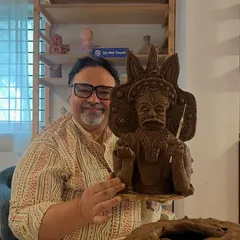 A proud moment for one of our students, holding his intricate terracotta sculpture. Our workshops, led by masters like Jayan sir, guide participants to shape not just clay, but meaning and memory.