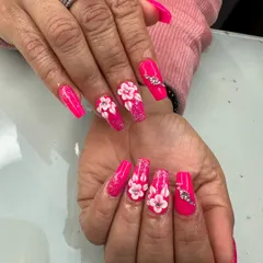 A closer look at this vibrant hot pink set. You can see the detail in the 3D flowers and the placement of the rhinestones.