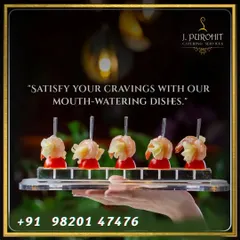 An example of my bite-sized appetizers, designed for easy mingling. Here, a hand holds a platter of delicate canapés, perfect for passing around at cocktail hours.