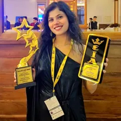 Another shot from the awards night, holding two of the trophies we were honored with. Each one represents a milestone in our journey and a promise to our students to always deliver our best.