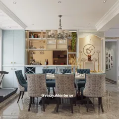 Here, I integrated a pooja unit directly into the dining area. The design features a beautiful 'Om' symbol and traditional motifs, creating a spiritual focal point that coexists harmoniously with the modern bar and dining furniture.
