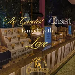 A beautifully lit chaat counter with our signature branding. We believe the greatest chaat is made with love, and our setups are designed to reflect the joy and passion we put into every dish we serve.