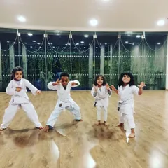 Say hello to some of our four-year-old warriors. We love seeing them strike confident poses after learning a new stance. It’s all about building self-esteem while improving balance and coordination.