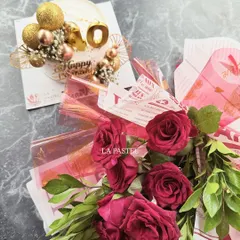 This classic gift combo includes a beautiful mini cake with a "40" topper and a fresh bouquet of red roses, perfect for a milestone birthday.