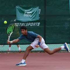 An action shot of Tavish Pahwa during the World U14 Asia Oceania competition. Developing powerful, efficient, and technically sound strokes is at the core of my training philosophy, preparing players for the intensity of high-level matches.