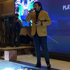 Here I am in my element, commanding the stage at a formal corporate function. Whether it's an annual day or an awards night, I know how to be a professional and engaging emcee, keeping the event on track while making sure the audience is entertained.
