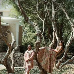 A creative and artistic portrait of the couple at their destination wedding, using the natural landscape to create a unique and memorable shot.