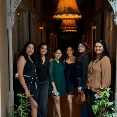 More smiles from our evening get-together. It's wonderful to see everyone dressed up and enjoying the social side of our wellness getaway.