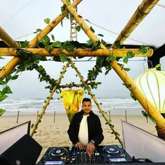 A stunning beach party setup in Vietnam. I love creating the perfect soundtrack for events in beautiful, natural settings like this.