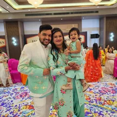 The whole family in custom mint-green! I loved creating these coordinated outfits for Neelam's family, and seeing them look so happy together is the best reward.