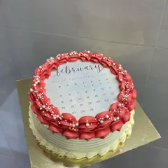 A pretty-in-pink version of my burn away cake, featuring a Valentine's calendar design. The red and white buttercream frosting makes it a beautiful centerpiece for your celebration.