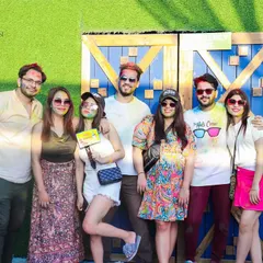 A group photo against the festive backdrop at Skygarden. These are the memories that make themed parties special.