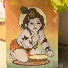 This painting of Bal Gopal, or Baby Krishna, is filled with a sense of innocent joy. I used bright, sparkling gemstones to bring his playful character to life as he enjoys his bowl of butter. It is a piece designed to invite happiness and positive energy into any space, especially a family home or prayer room.