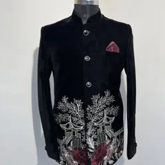 A unique black velvet Jodhpuri featuring an embroidered landscape with Japanese-style pagodas and trees. This is a perfect example of how we can turn a personal idea into wearable art.