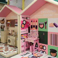 For little ones who love imaginative play, I have dedicated pretend-play areas. This setup includes a mini kitchen and a dressing room, complete with a vanity for endless creative fun.