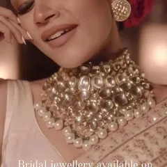 A close-up of a Kiara Advani-inspired choker, featuring large uncut Polki stones and pearl drops. This is a very popular rental piece for receptions and sangeets.