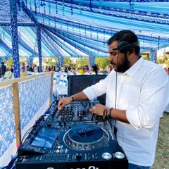 A clear view of my professional DJ console in action. I use industry-standard Pioneer DJ gear because I don't believe in quick fixes. Your wedding deserves full quality sound, and that's what I guarantee.