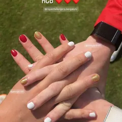 The RCB team showing off their fresh manicures in the team colors. It was such a proud moment for me and my team.