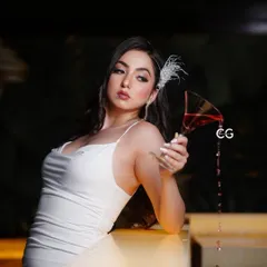 A Merry Christmas shot from my retro Bollywood shoot. The spilled wine adds a touch of drama and artistry to this glamorous photo.
